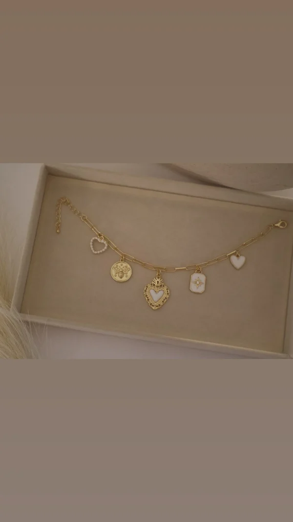 7E25B0B9-9DBB-44AC-AB87-DA65CA2D3EE7-1.webp Pulsera con Dijes de Corazones y Medallones