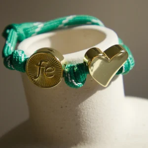 IMG_4228-scaled-1.webp Pulsera de Cordón Ajustable con Dijes